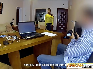 Outcast teen from Ethiopia blows a thick black rod during first casting